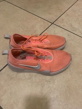 Nike Coral/Peach Knit Slip-On Sneakers with Silver Swoosh